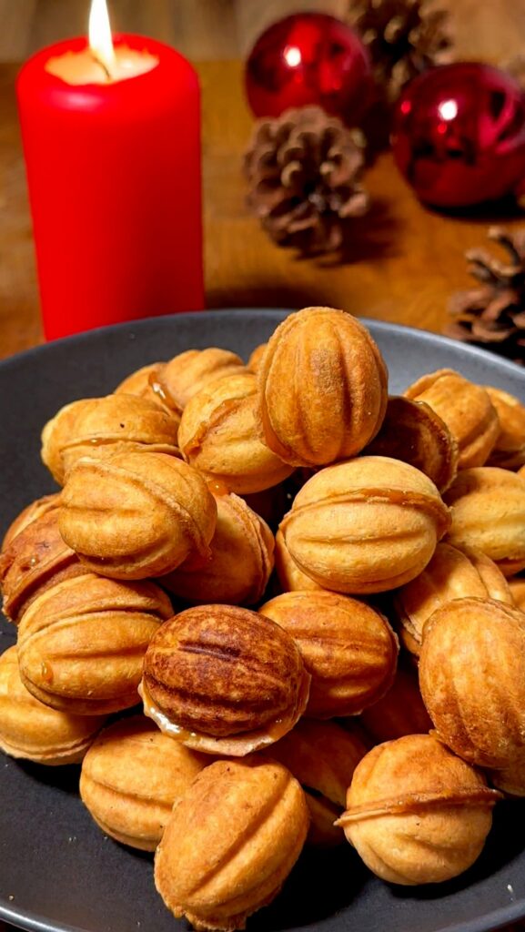 Walnut Cookies with Caramel and Hazelnut Filling