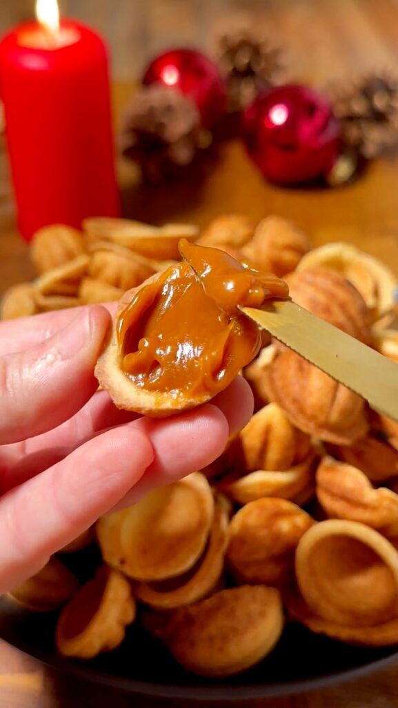 Walnut Cookies with Caramel and Hazelnut Filling