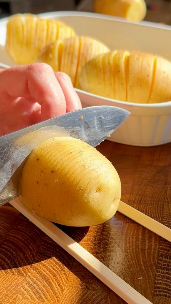 cut the potatoes between two chopsticks