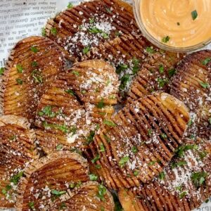 Crispy Accordion Fried Potatoes served with parmesan and parsley